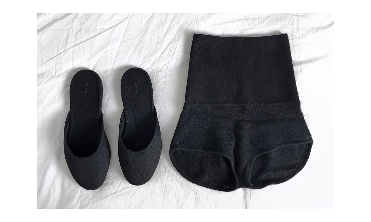 The Row Slippers and Khaite Belinda Shorts