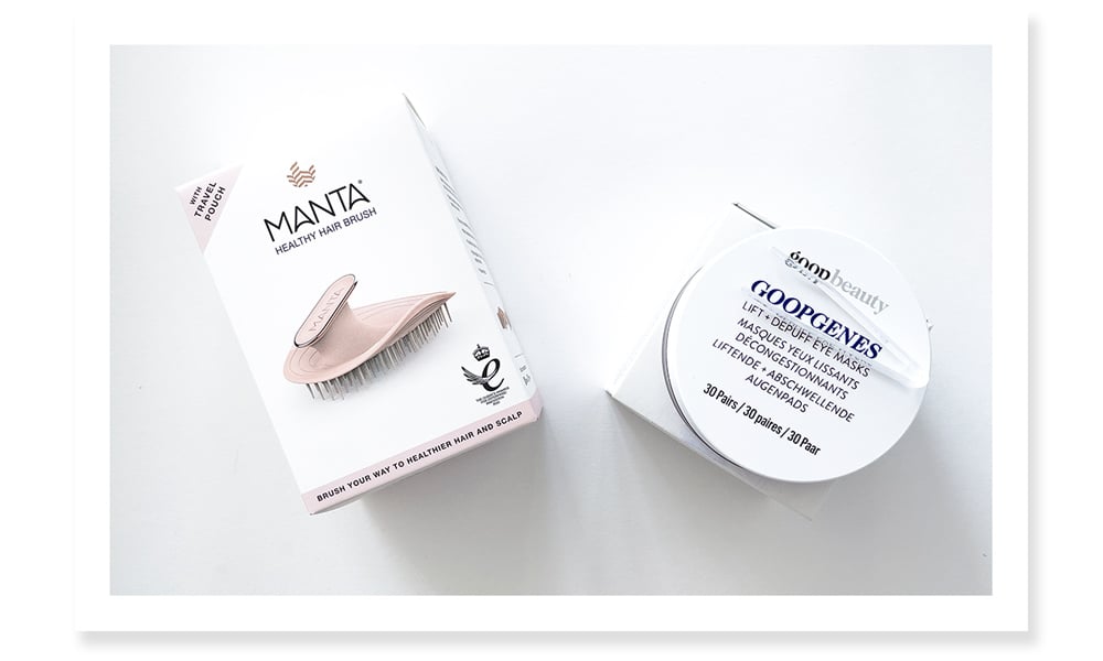 Photo of a Manta hair brush box and Goop eye masks container